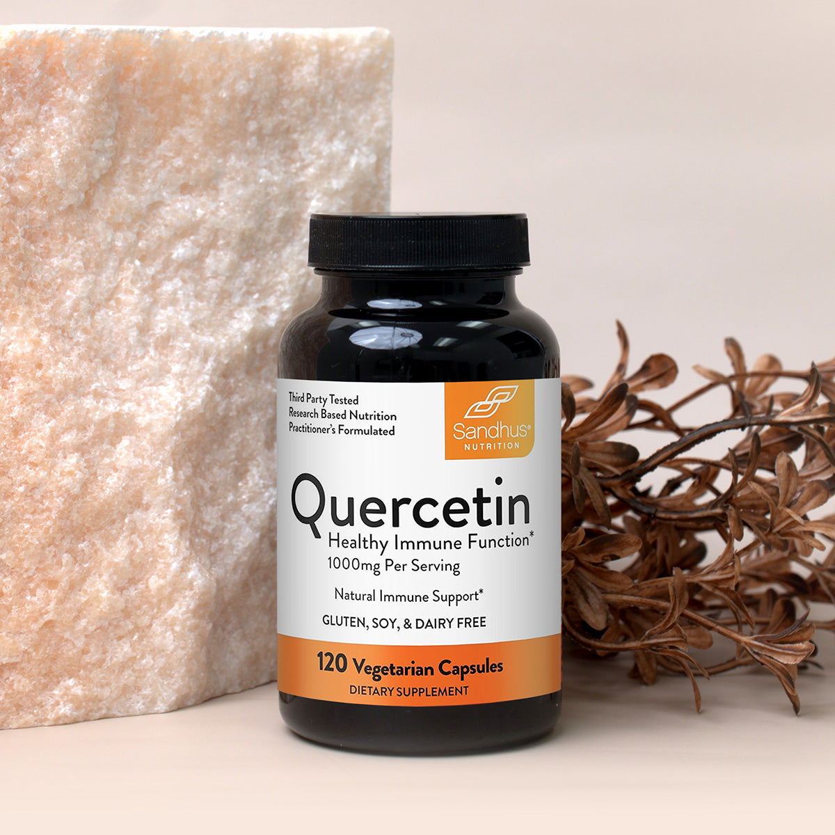 Supplement bottle labeled 'Quercetin' on a neutral background