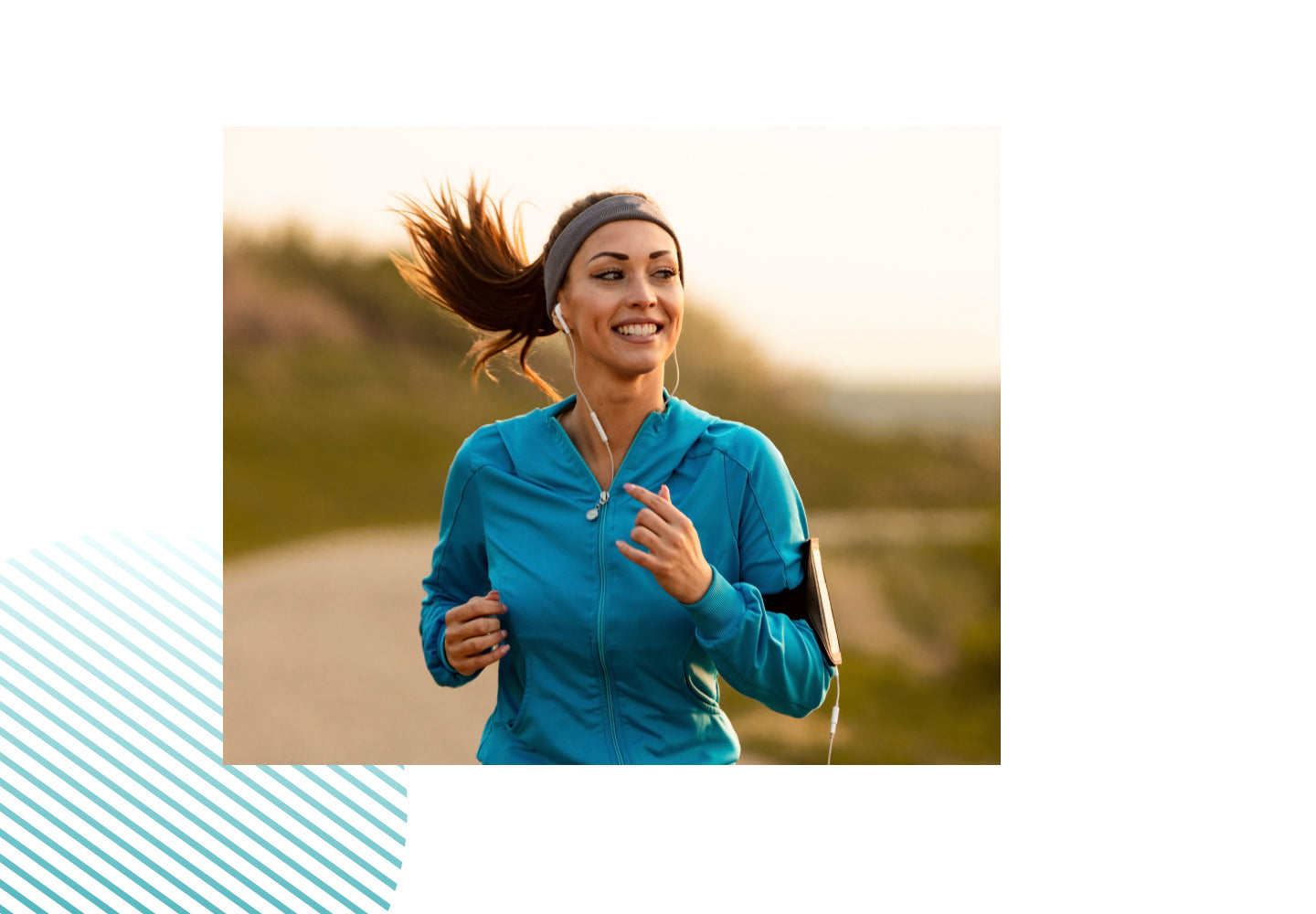 Active woman jogging in a blue jacket with earphones, representing energy, vitality, and lifestyle support from Sandhu’s 15 Day Cleanse.