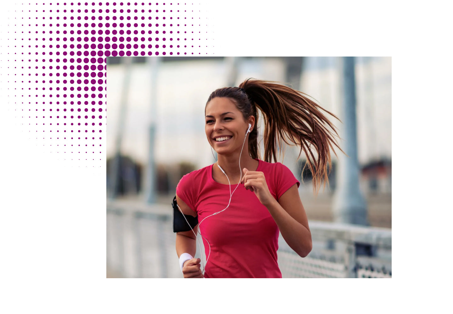 Smiling woman jogging with earphones, representing energy, circulation, and gut health with Resveratrol.