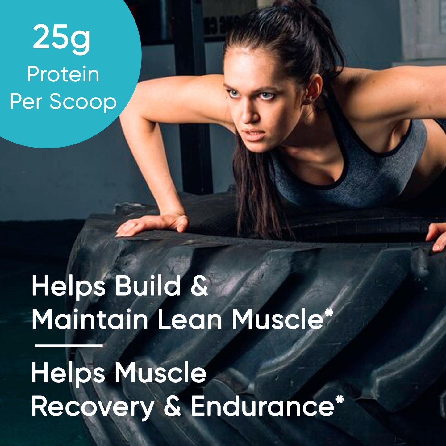 Focused woman training with tire in gym; protein supplement supports lean muscle, recovery, and endurance.