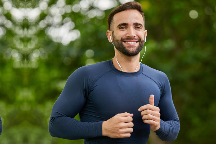Healthy man jogging with energy supported by Zinc and Quercetin supplement benefits