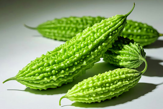 Fresh bitter melon (Momordica charantia) whole fruits shown close-up, known for supporting healthy blood sugar and glucose balance naturally