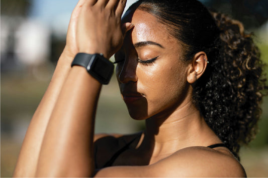 Woman practicing mindfulness outdoors in sunlight — natural Vitamin D3 for better brain focus and mood.