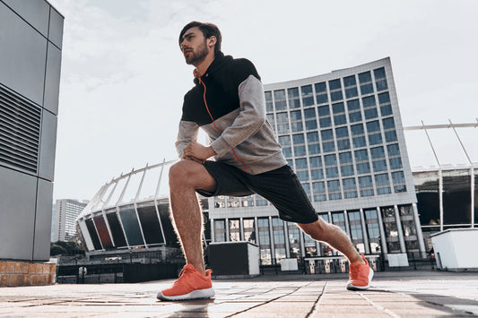 Man stretching outdoors before exercise, representing physical activity, endurance, energy, and an active lifestyle supported by healthy habits.