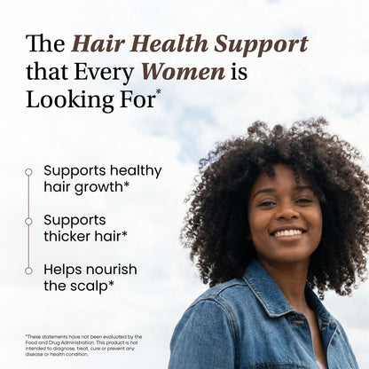 Woman with curly hair smiling outdoors with text about hair health support.