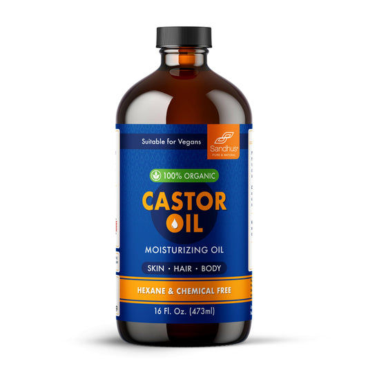 Bottle of castor oil with a blue label on a white background