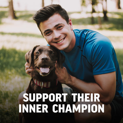 Man in a blue shirt with a brown dog outdoors, with text 'Support Their Inner Champion'.