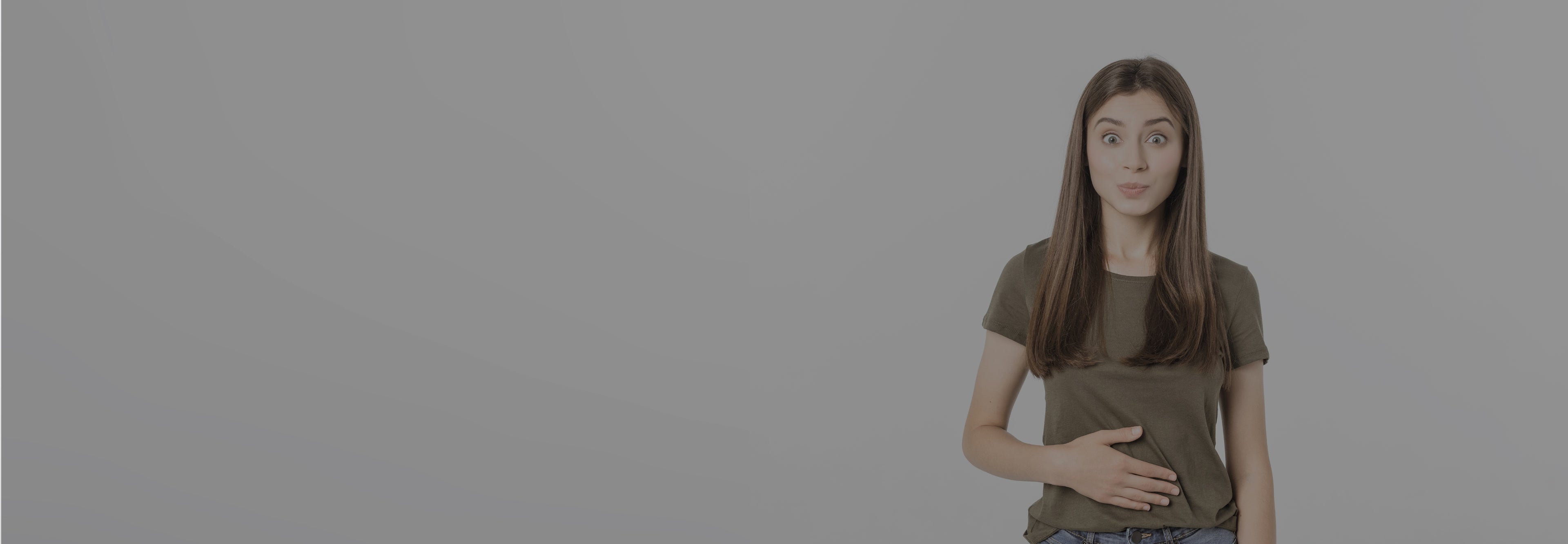 Woman wearing a brown t-shirt on a gray background