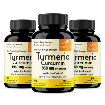 Three bottles of Turmeric Curcumin supplement with Sandhus Nutrition label on a white background